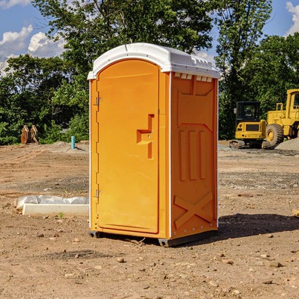 what is the cost difference between standard and deluxe portable restroom rentals in Amagon